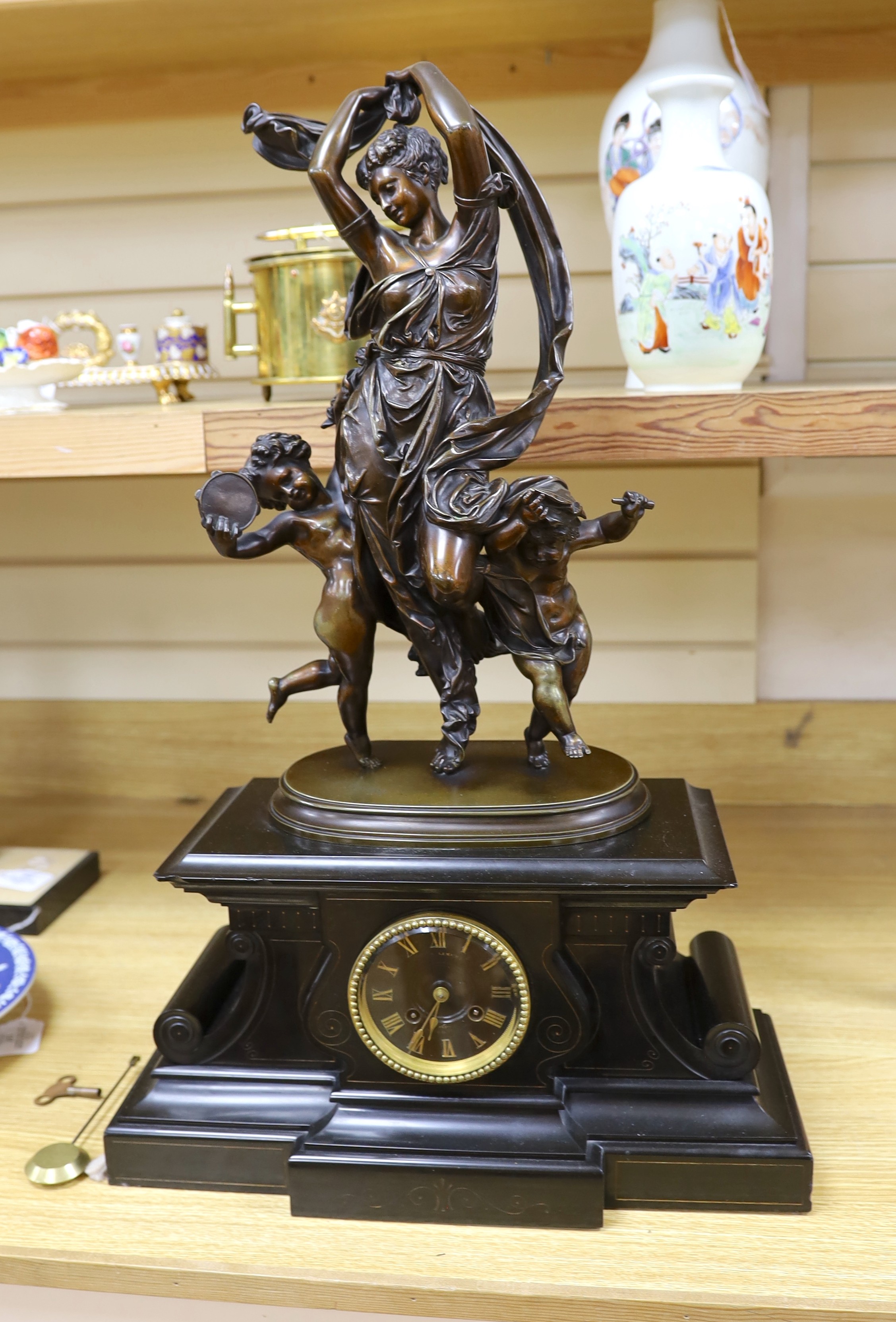 A late 19th century French bronze figural mantel clock, A. Carrier, 66cm